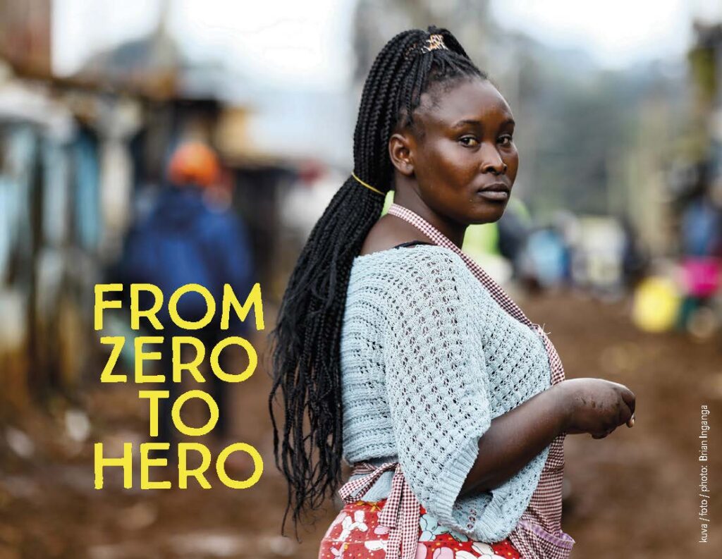 Valokuvassa nuori nairobilainen nainen on kääntynyt katsomaan kohti kameraa. Naisella on vaaleansininen paita ja pitkät mustat hiukset. Kuvan päällä on teksti From zero to hero.